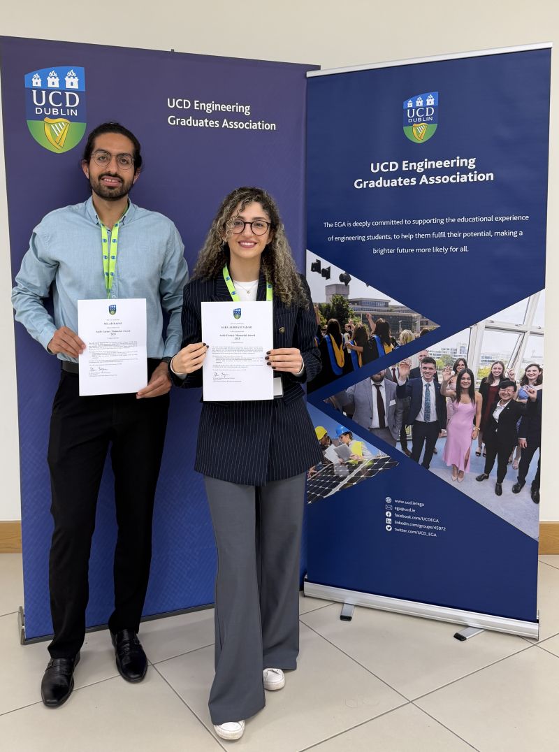 Photo of Saba and Milad holding their Aoife Carney Memorial Awards
